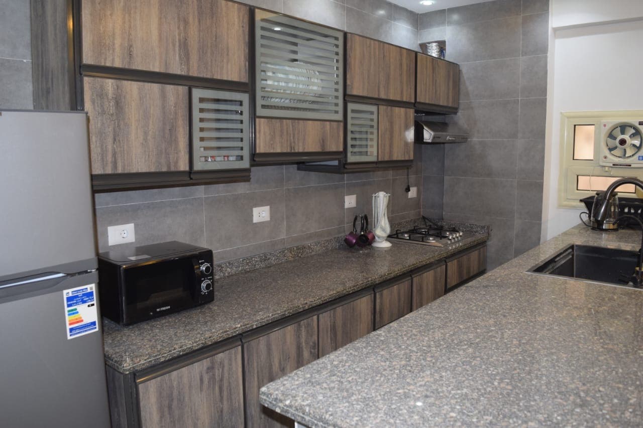 Sheikh Zayed / 8th District / 1st Neighborhood / Building 64 3